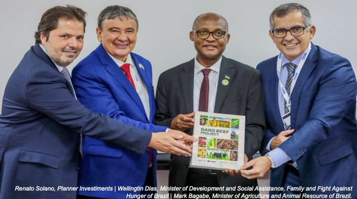 Professional business executives shaking hands in a modern corporate setting